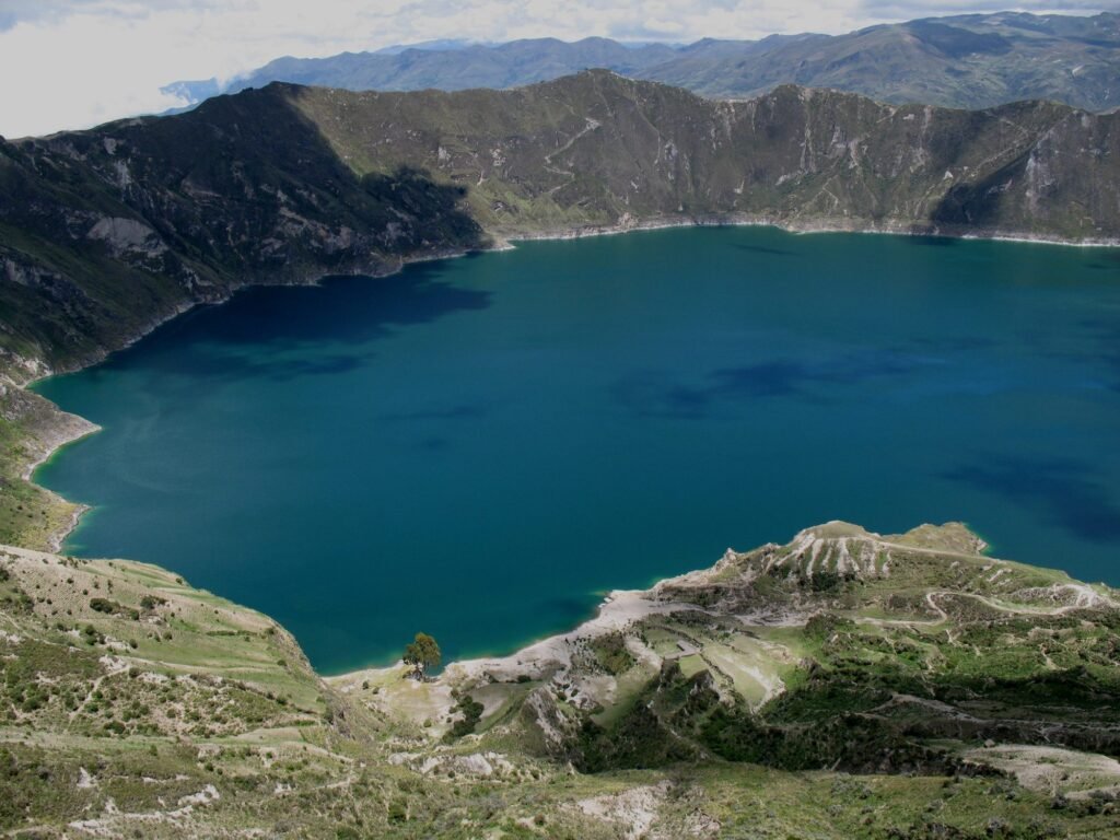 The turquoise Quilotoa Lagoon inside the volcanic crater