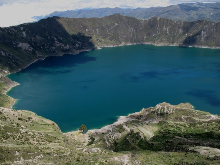 The turquoise Quilotoa Lagoon inside the volcanic crater